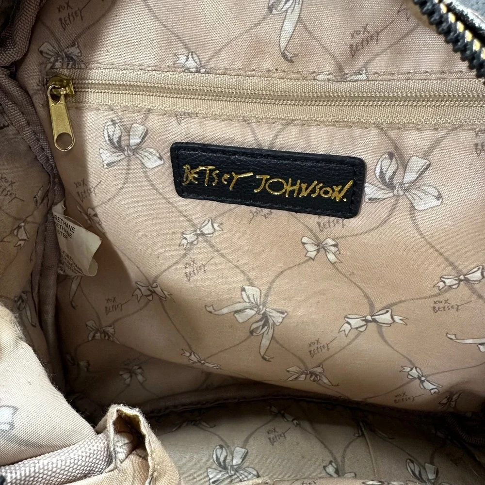 Betsey Johnson give this